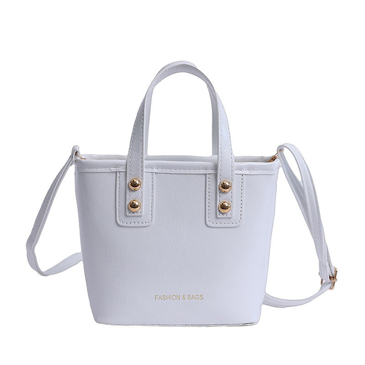 Women's mini bag with elegant structure and practical carrying handle