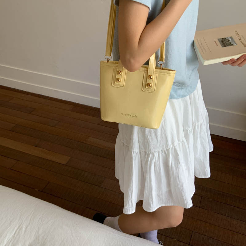 Women’s mini handbag with elegant chain closure