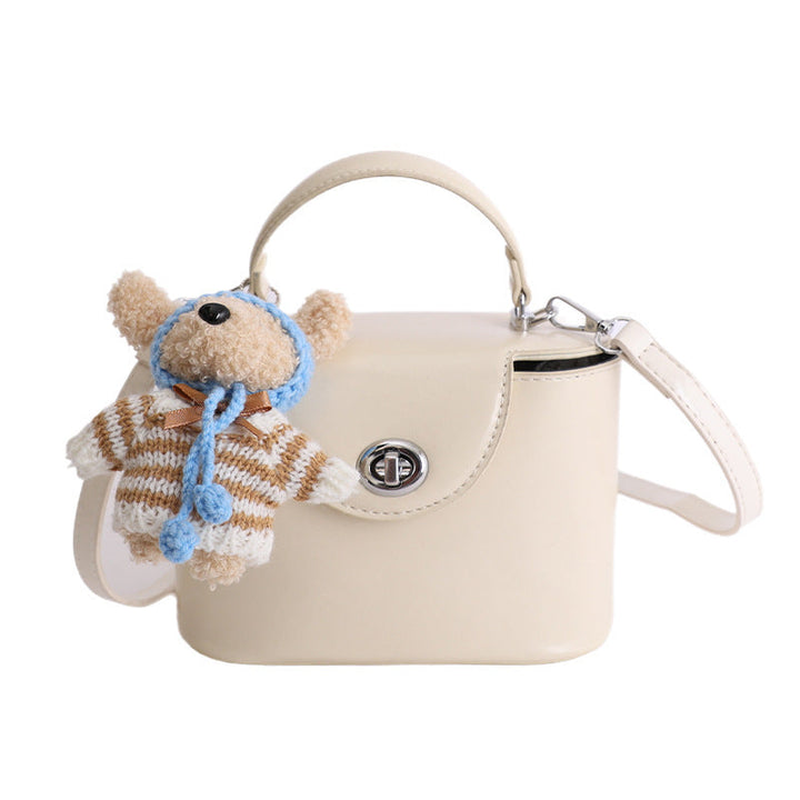 Women’s mini handbag with cute animal pendant