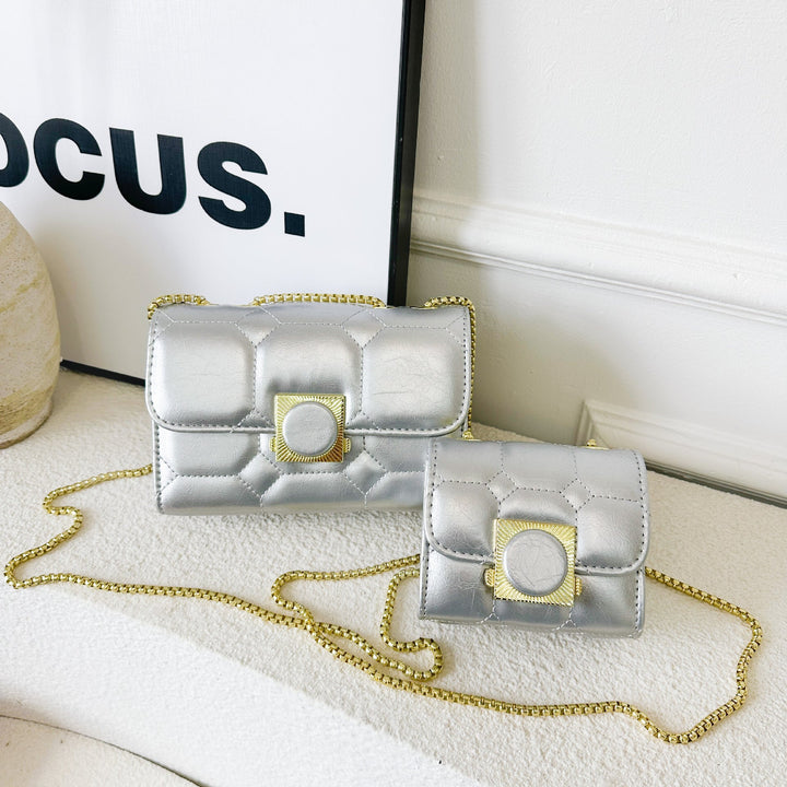 Ladies elegant wrist bag with coordinated mini wallet