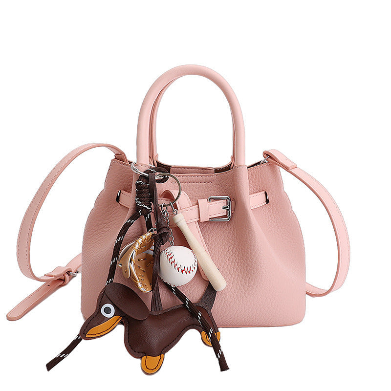 Women Designer Bucket Bag with playful animal charm