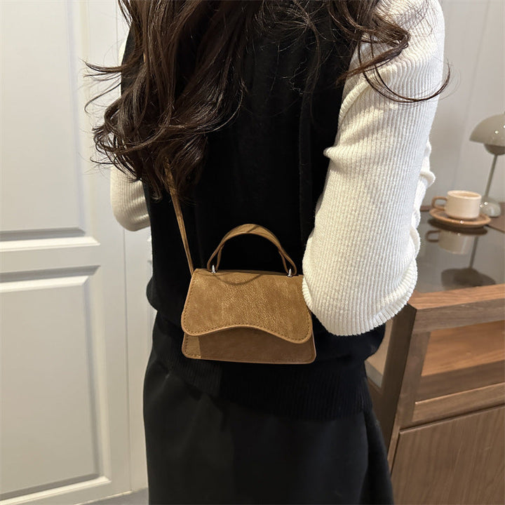 Women's mini handbag with removable carry handle