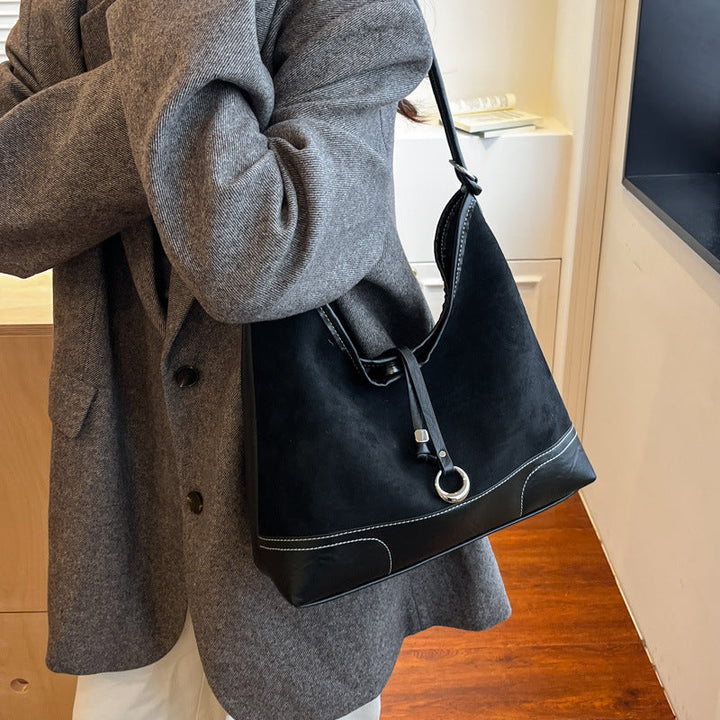 Women's elegant tote bag with authentic suede elements