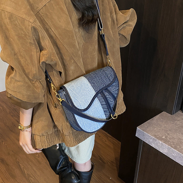 Women’s shoulder bag made of durable denim with adjustable shoulder strap