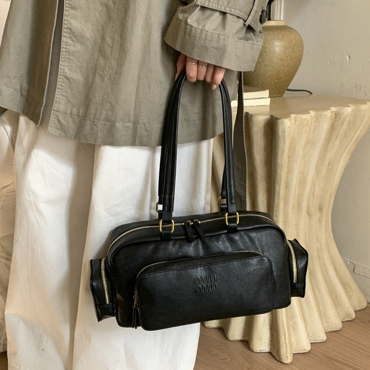 Women's elegant shoulder bag with practical organizer