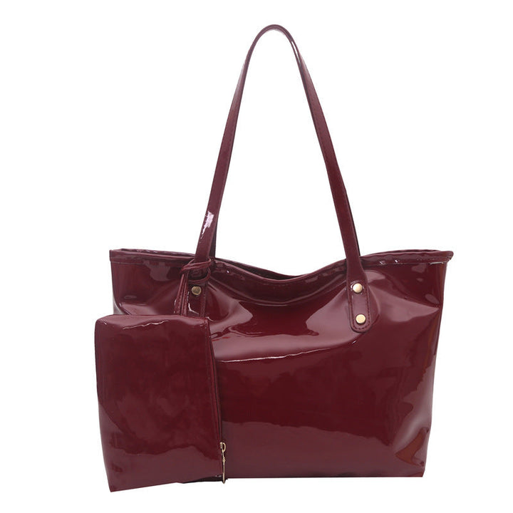 Women's elegant patent leather tote with removable interior compartment