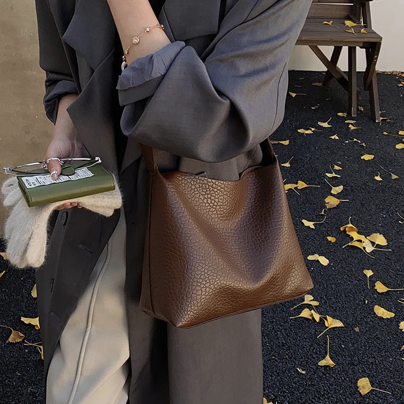 Women stylish shoulder bag with textured design