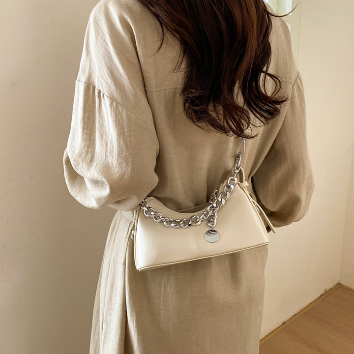 Women's fashionable shoulder bag with sparkling chain accent