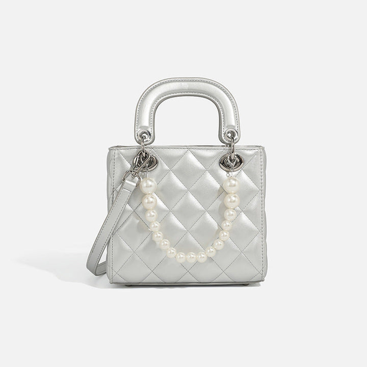 Ladies mini handbag with pearl-embellished chain and quilted design