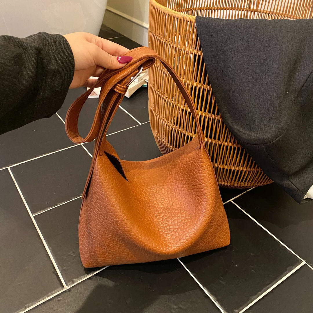 Women stylish shoulder bag with textured design