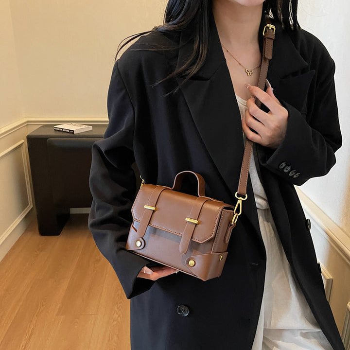 Women's mini handbag with textured design and detachable shoulder strap