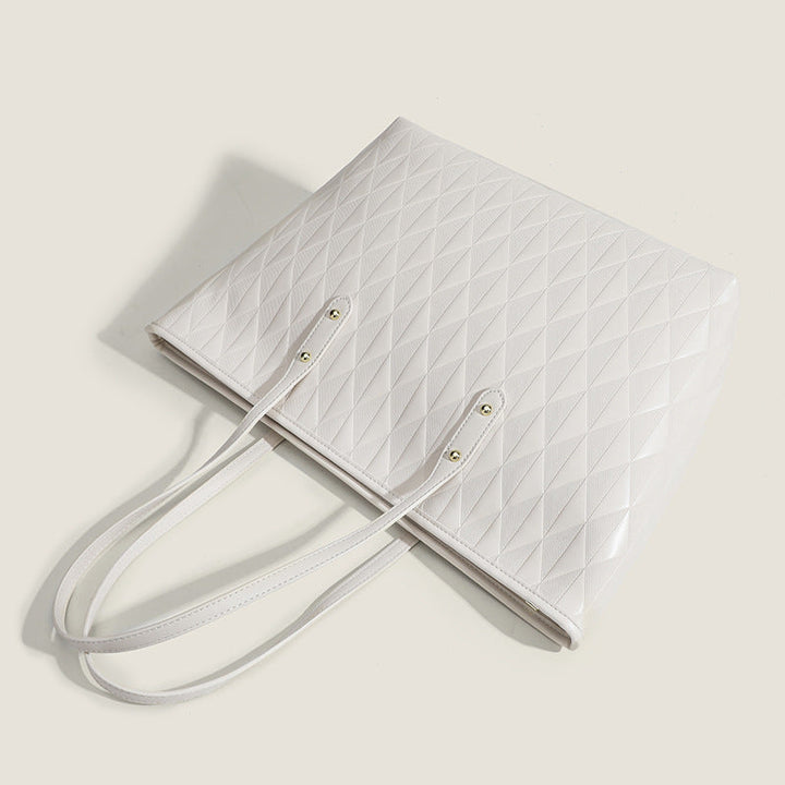 Women's tote bag with elegant diamond design and practical inner compartments