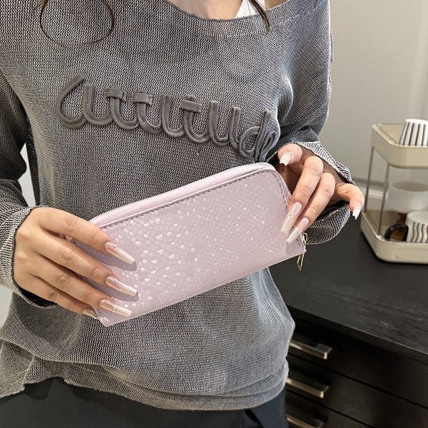 Women's elegant wallet in luxurious snake pattern