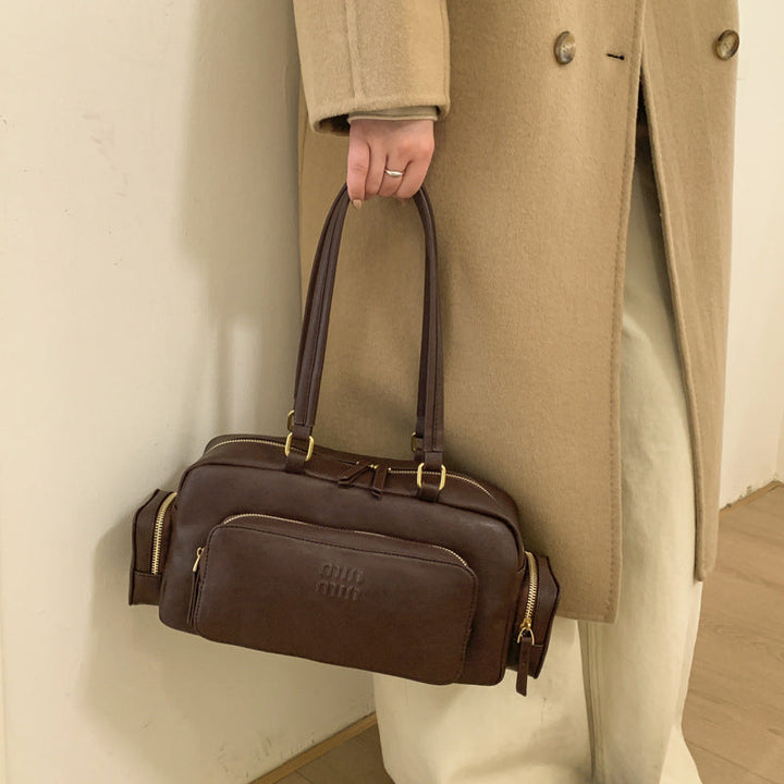 Women's elegant shoulder bag with practical organizer