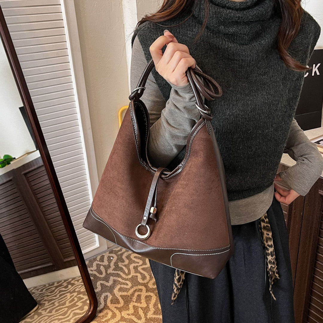 Women's elegant tote bag with authentic suede elements