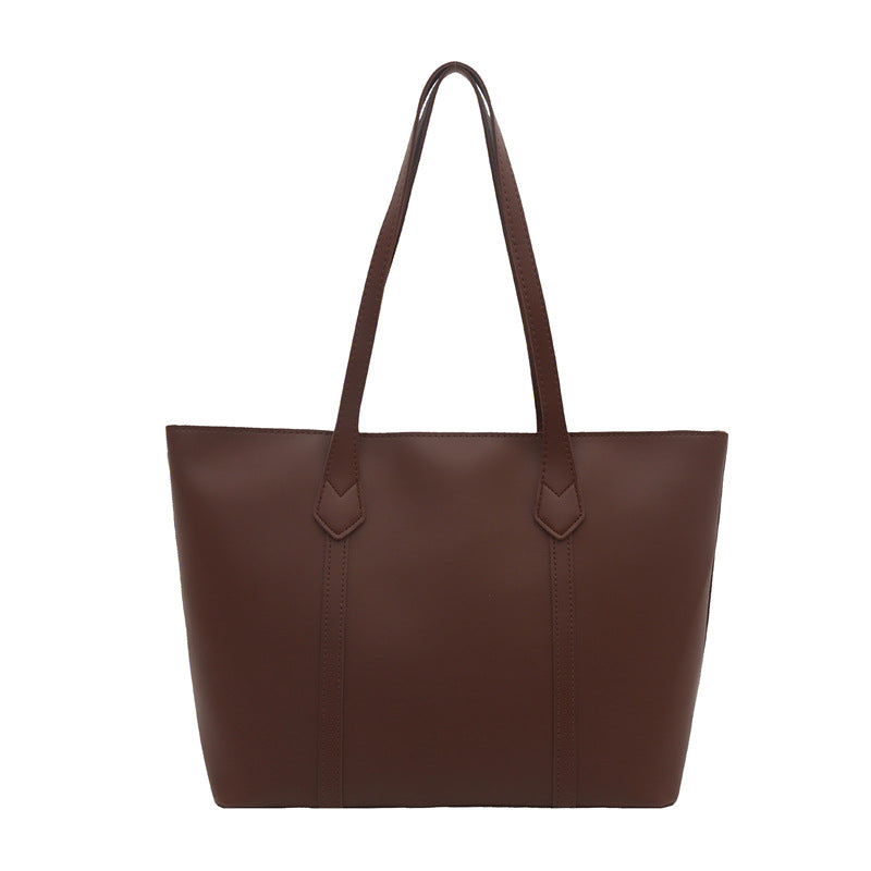 Women's elegant tote bag with minimalist structure