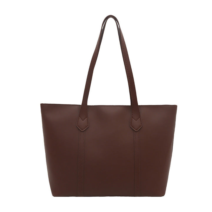Women's elegant tote bag with minimalist structure