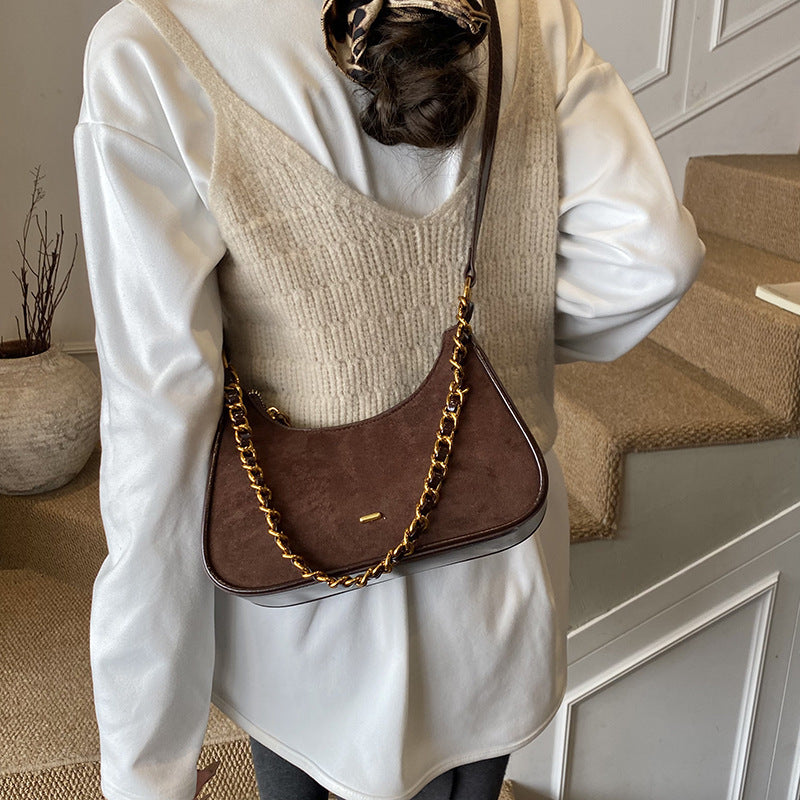 Women's fashionable shoulder bag in vintage look with chain strap