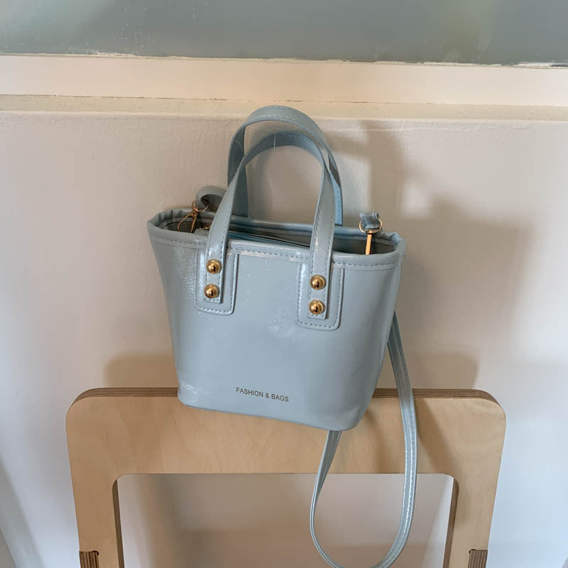 Women’s mini handbag with elegant chain closure