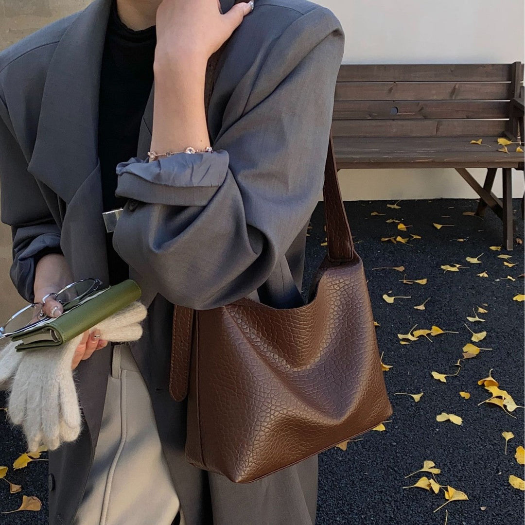 Women stylish shoulder bag with textured design