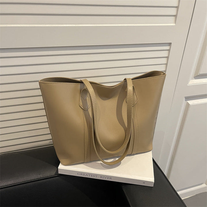 Women's elegant tote bag with minimalist structure