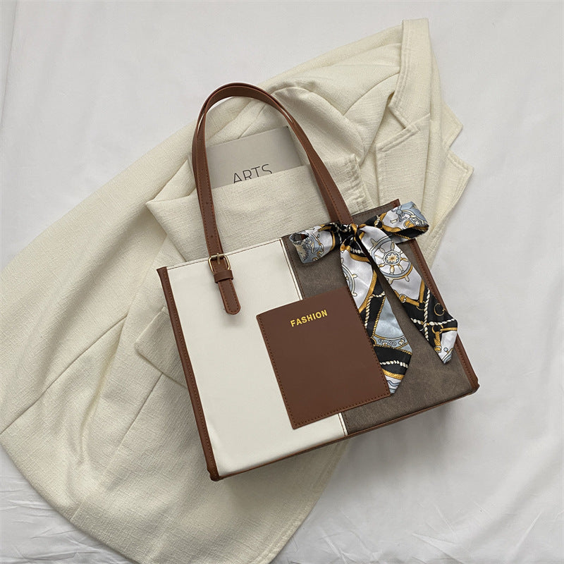 Women's tote bag with fashionable design and decorative silk ribbon