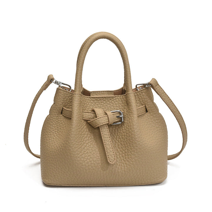 Women's mini handbag with stylish button closure