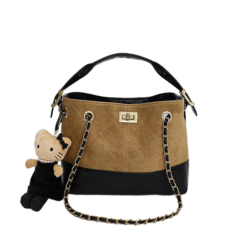 Women's shoulder bag with elegant chain accent and cute pendant
