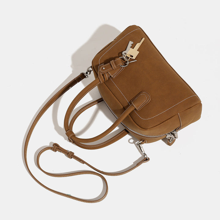 Women's handbag with removable and adjustable shoulder strap