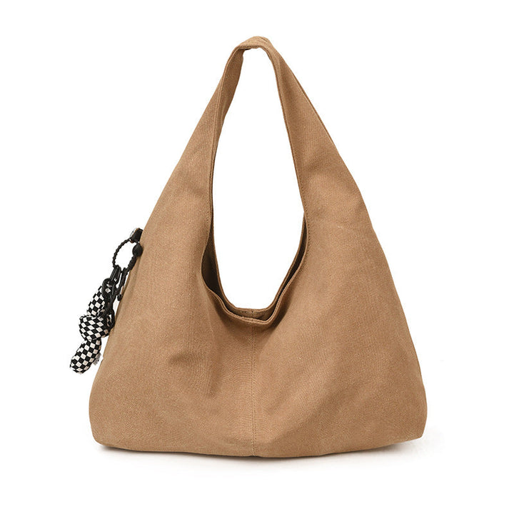 Women's fashionable tote bag with innovative carrying opening
