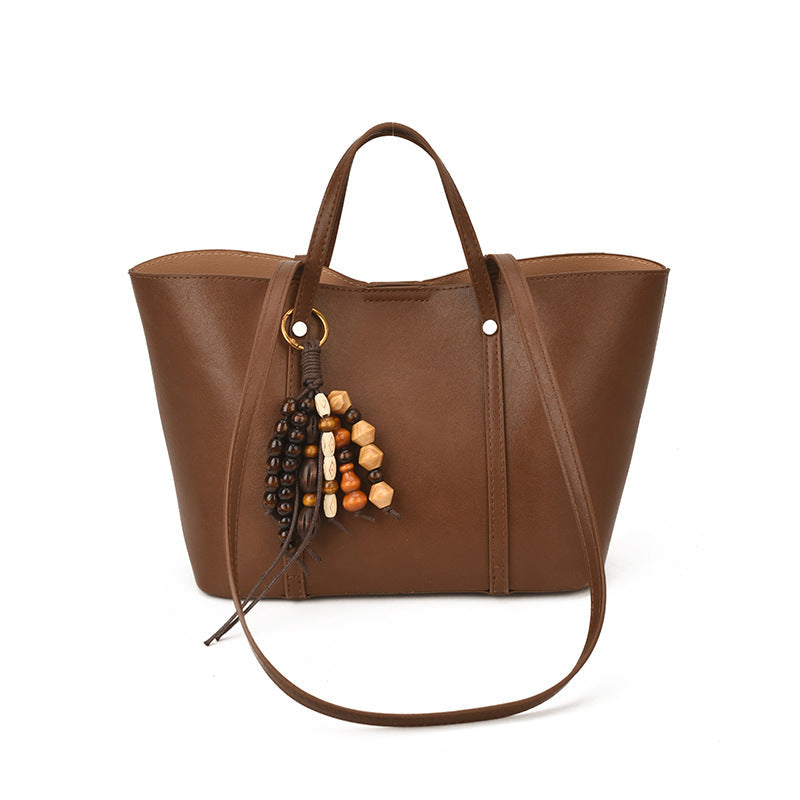 Women's Tote Bag with Modern Design and Unique Beaded Pendant