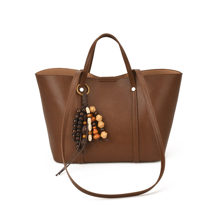 Women's Tote Bag with Modern Design and Unique Beaded Pendant