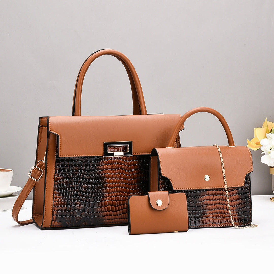 Ladies handbag set with luxurious crocodile leather look and removable clutch