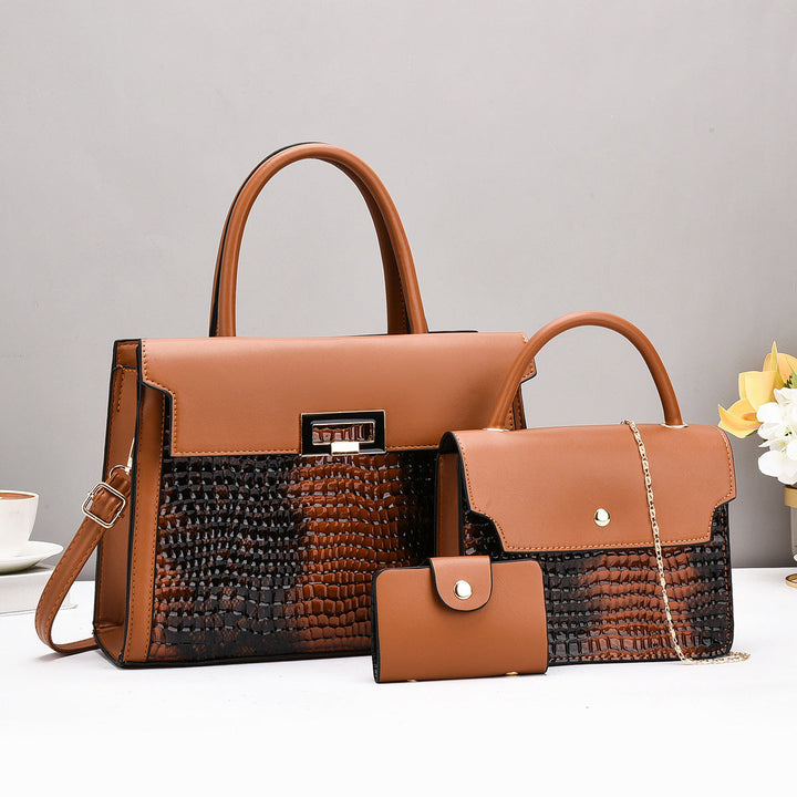 Ladies handbag set with luxurious crocodile leather look and removable clutch