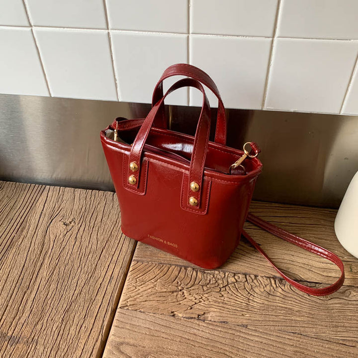 Ladies Mini-Handbag with elegant carry handle and practical inner compartment