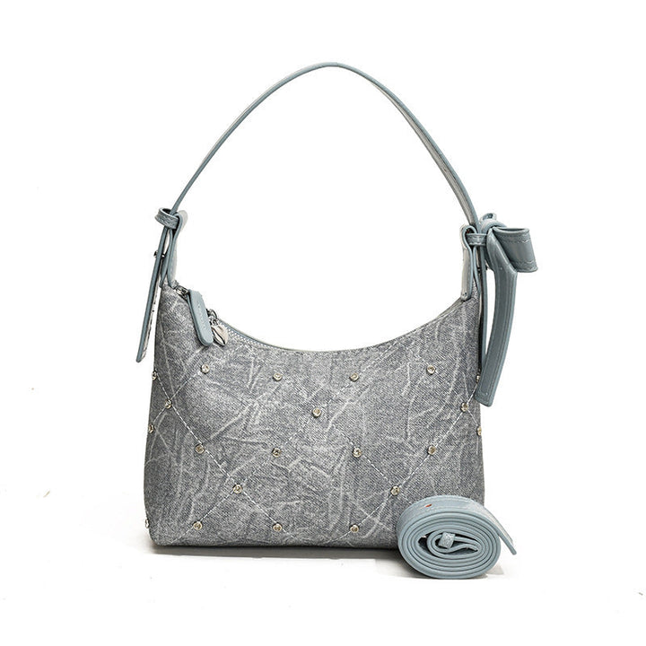 Ladies fashionable shoulder bag with sparkling appliqués