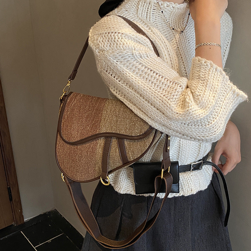Women’s shoulder bag made of durable denim with adjustable shoulder strap