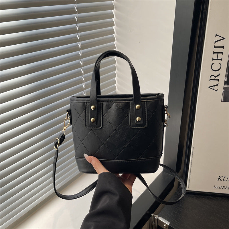 Women's elegant mini bucket bag with detachable shoulder strap