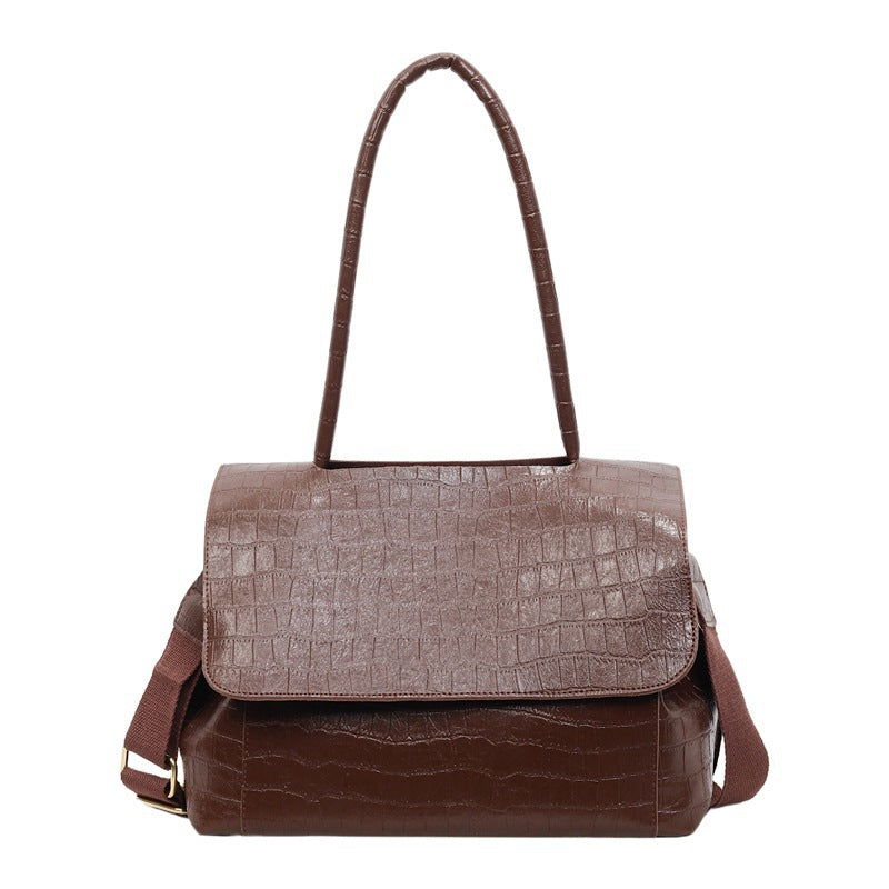 Women's shoulder bag in elegant crocodile look with adjustable shoulder strap