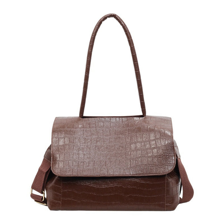 Women's shoulder bag in elegant crocodile look with adjustable shoulder strap