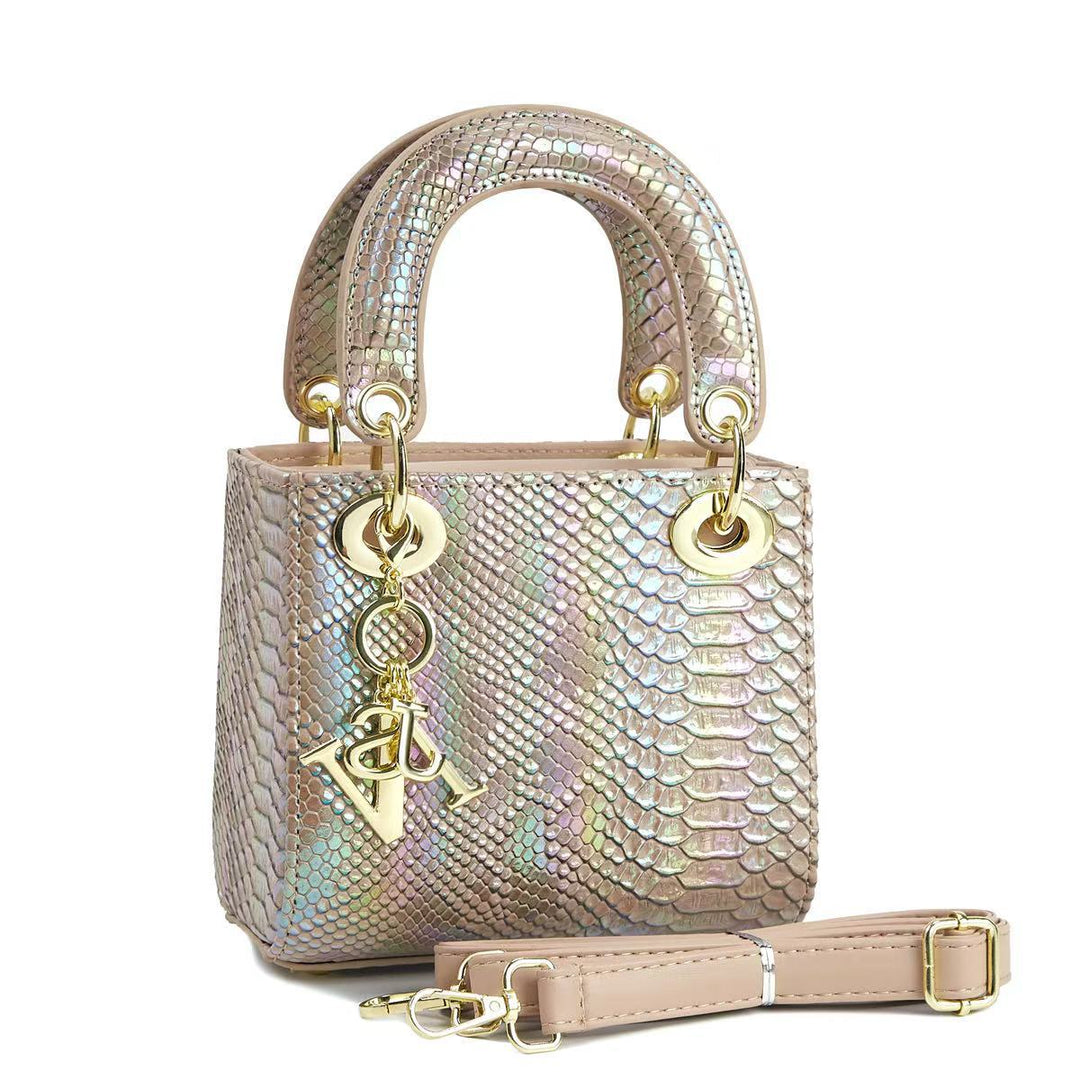 Ladies elegant mini handbag in modern snakeskin look with removable shoulder strap