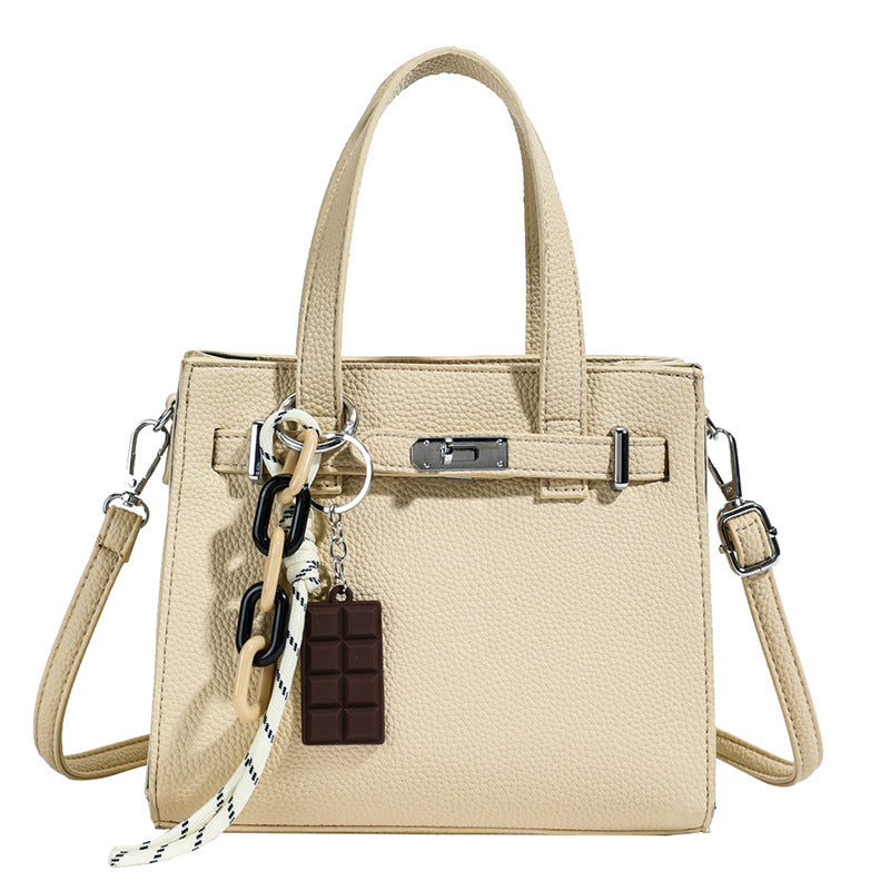 Ladies elegant mini bag with detachable pendant