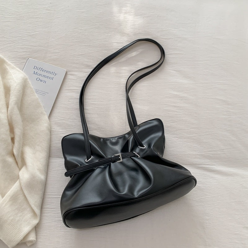 Women's shoulder bag made of high-quality synthetic leather with adjustable drawstring