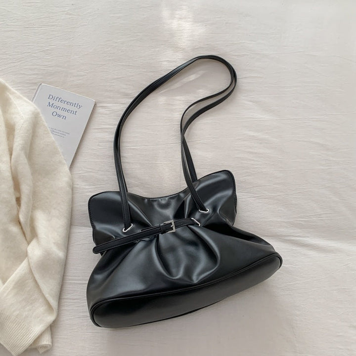 Women's shoulder bag made of high-quality synthetic leather with adjustable drawstring