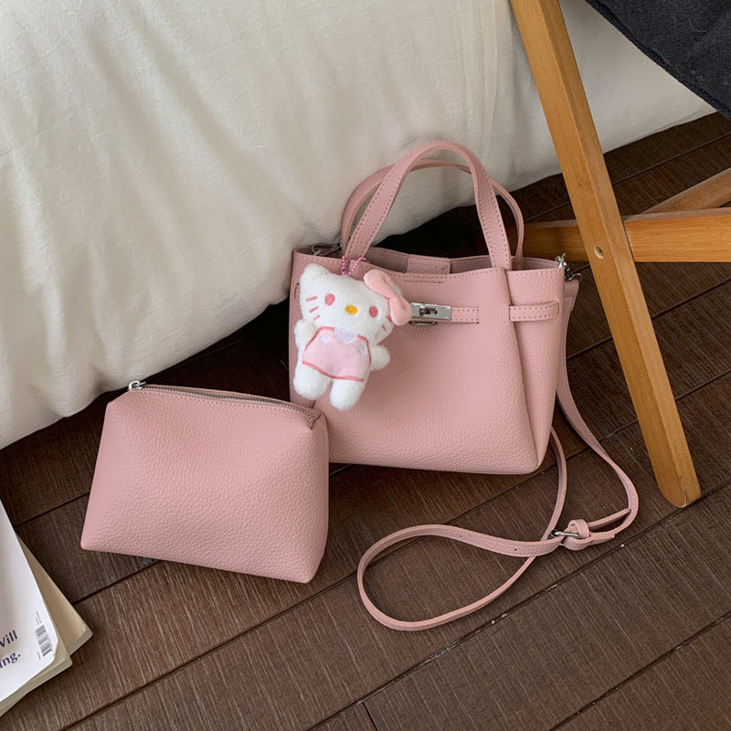 Ladies mini handbag with detachable cosmetic pouch
