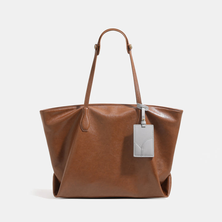 Women high-quality tote bag made of soft synthetic leather with textured design