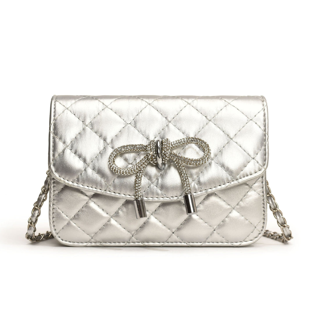 Ladies mini handbag with luxurious quilted pattern and sparkling chain pendant