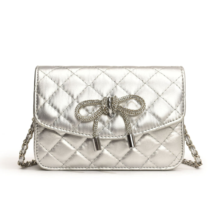 Ladies mini handbag with luxurious quilted pattern and sparkling chain pendant