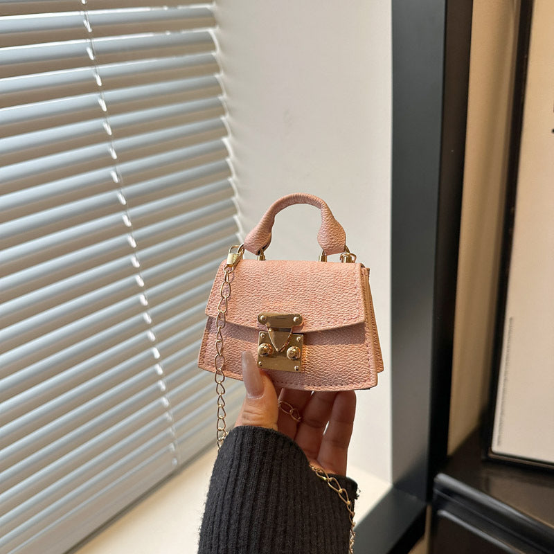 Women's mini handbag with decorative chain strap