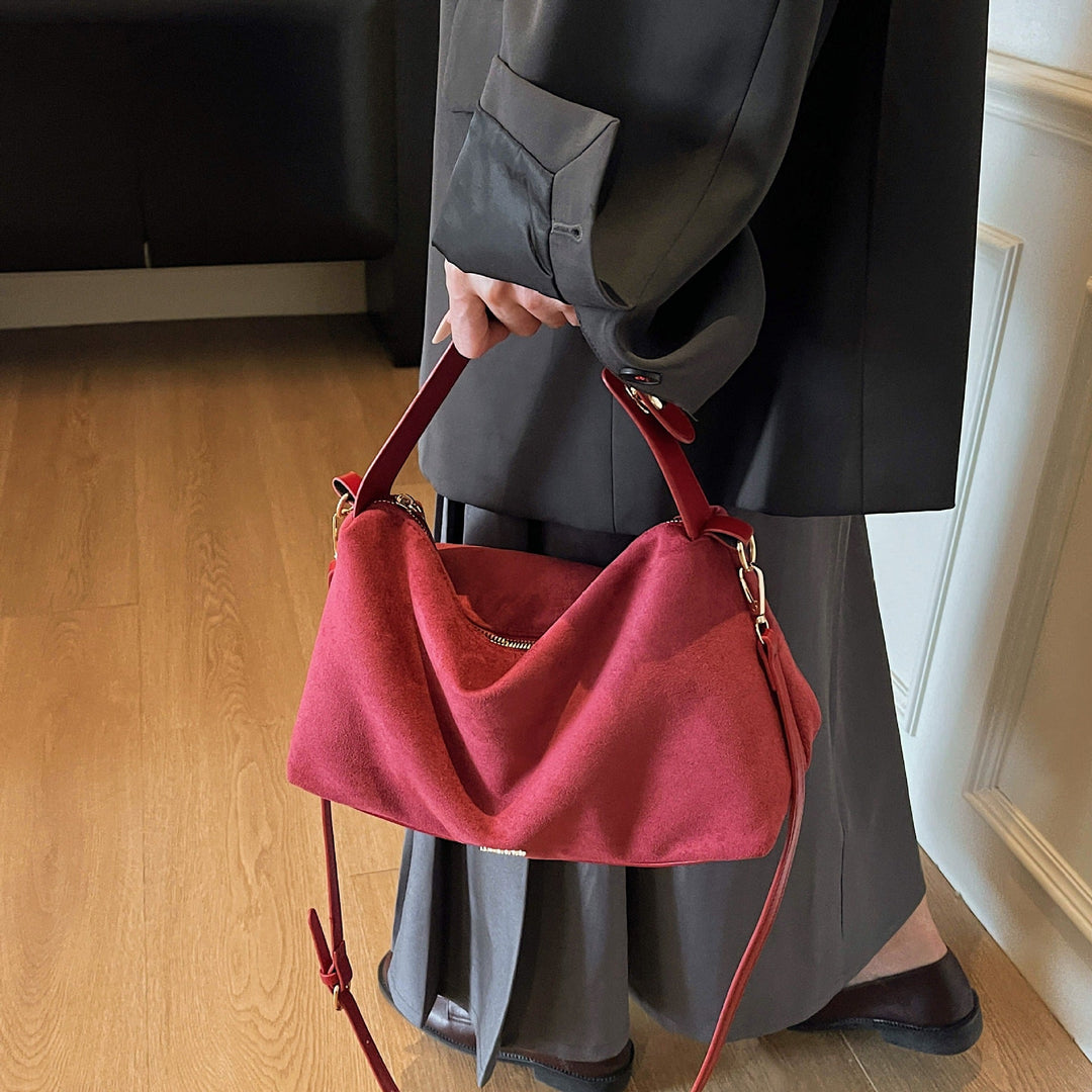 Women's practical shoulder bag made of soft suede